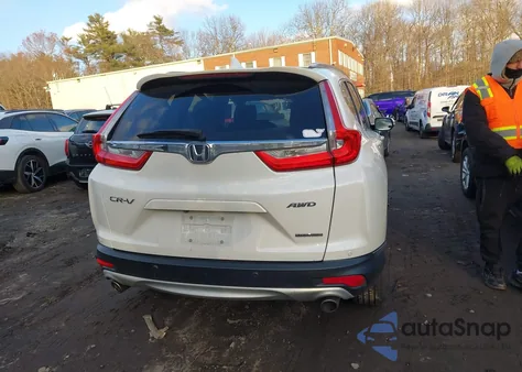 2017 Honda Cr-V Touring z USA, uszkodzony, nr VIN 5J6RW2H98HL027116